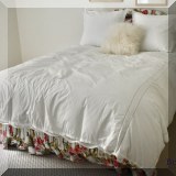 F34. Queen bed with floral Brunschwig & Fils chintz peony fabric headboard and matching bedskirt. 47”h 